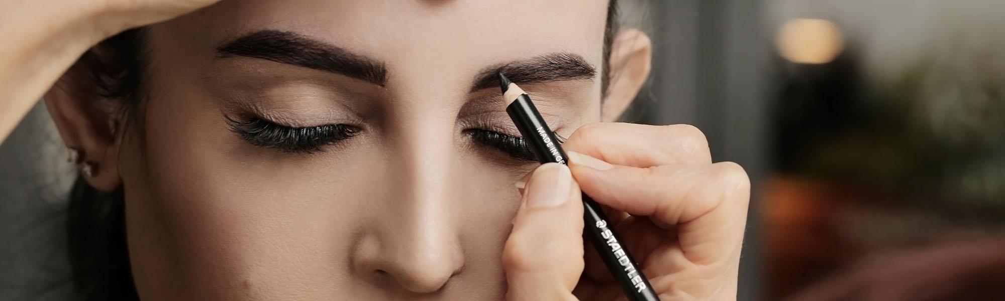 woman eyebrows being treated