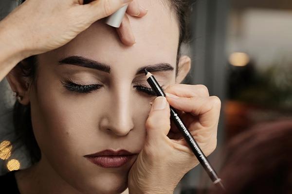woman getting her brows done